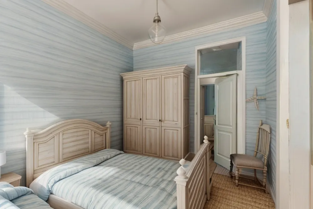 After: the same bedroom with blue-washed plank walls, a white arched bed and a cream cupboard